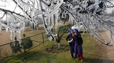Kashmir continues to reel under freezing night temperatures