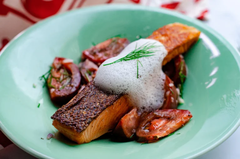 The wasabi foam is in the bowl with fish