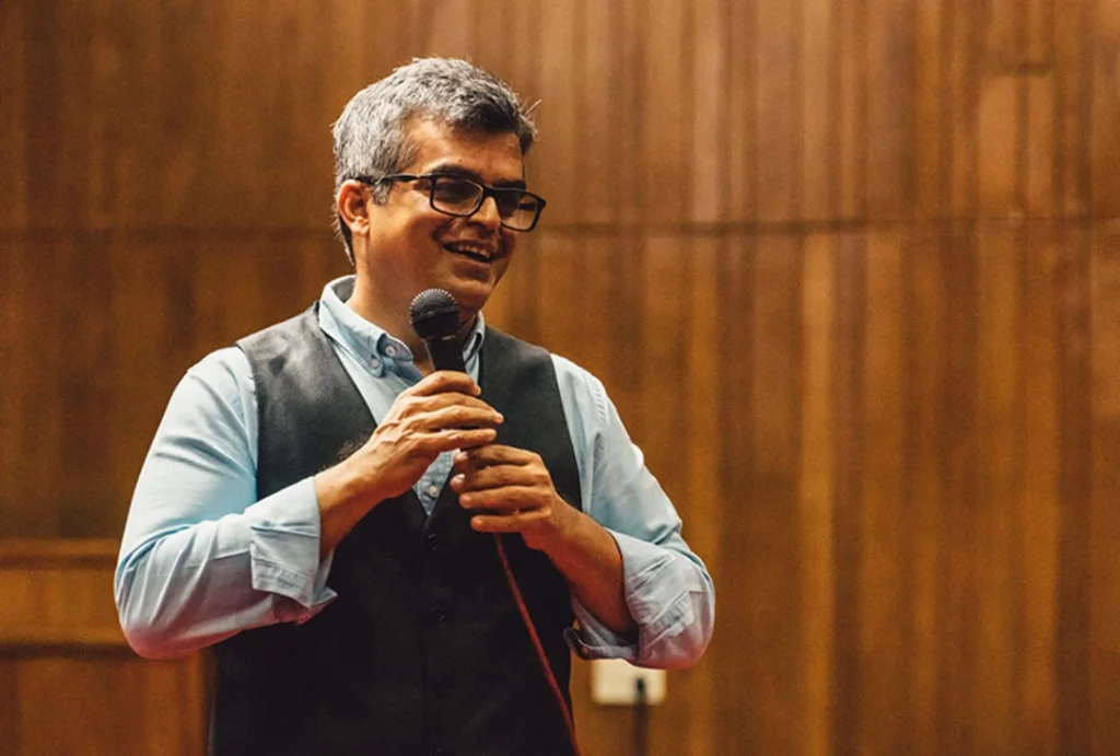 The image shows the man who is atul khatri the comedien