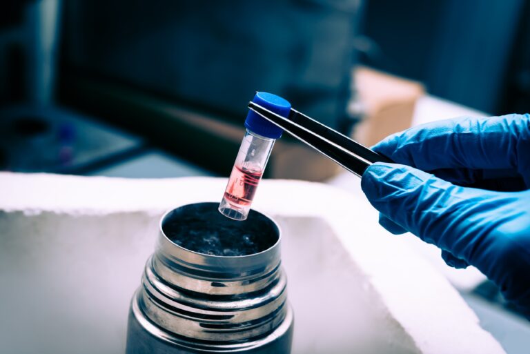 The image shows stem cell banking and there is a simple collection tool in the hand of somebody