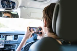 Can Streaming or Gaming in the Car Get You in Legal Trouble in Texas?