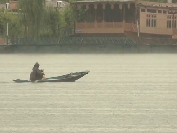 A view from Dal lake during heavy rain (Photo/ANI)
